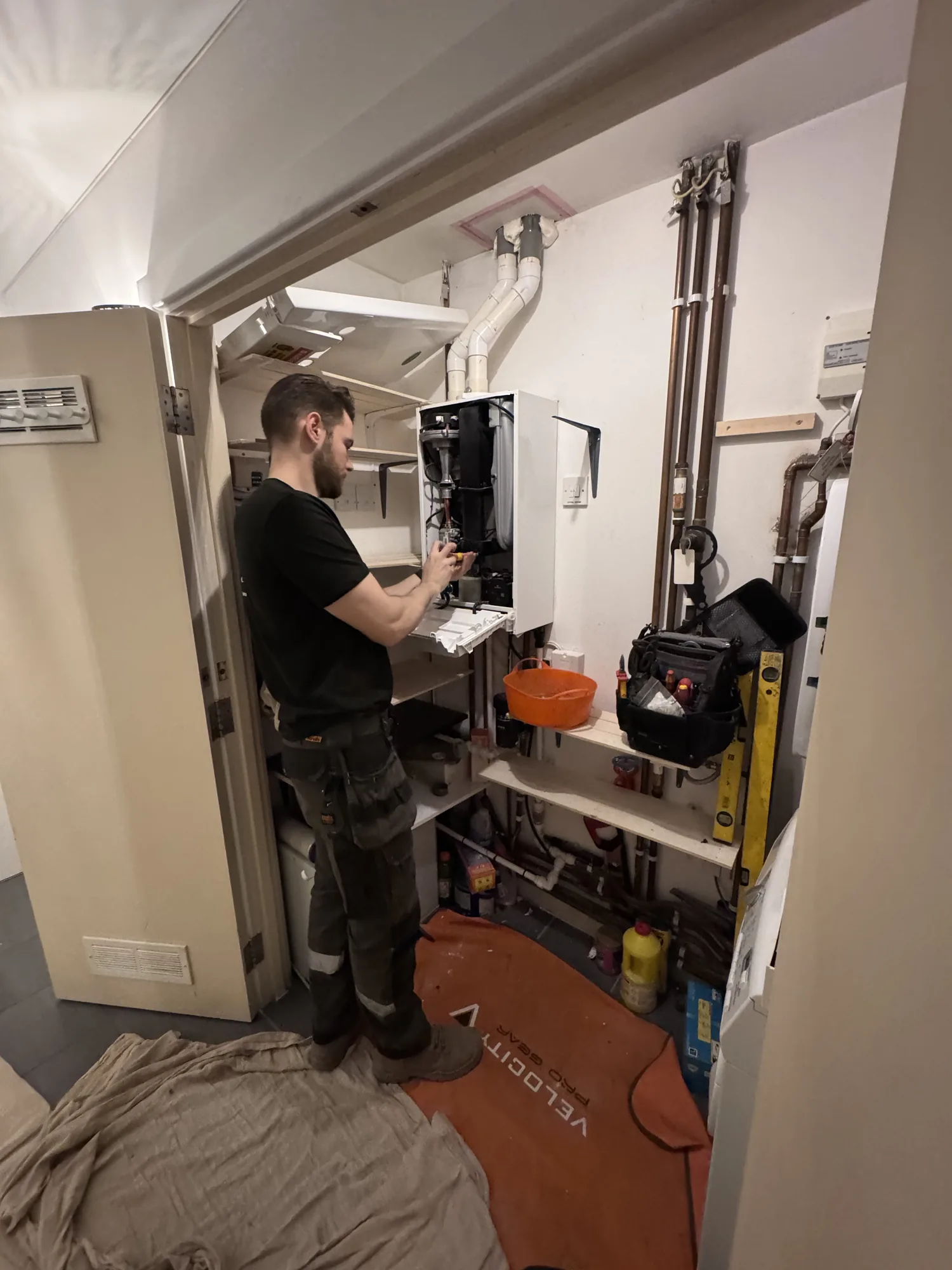 Boiler internals being checked during a service
