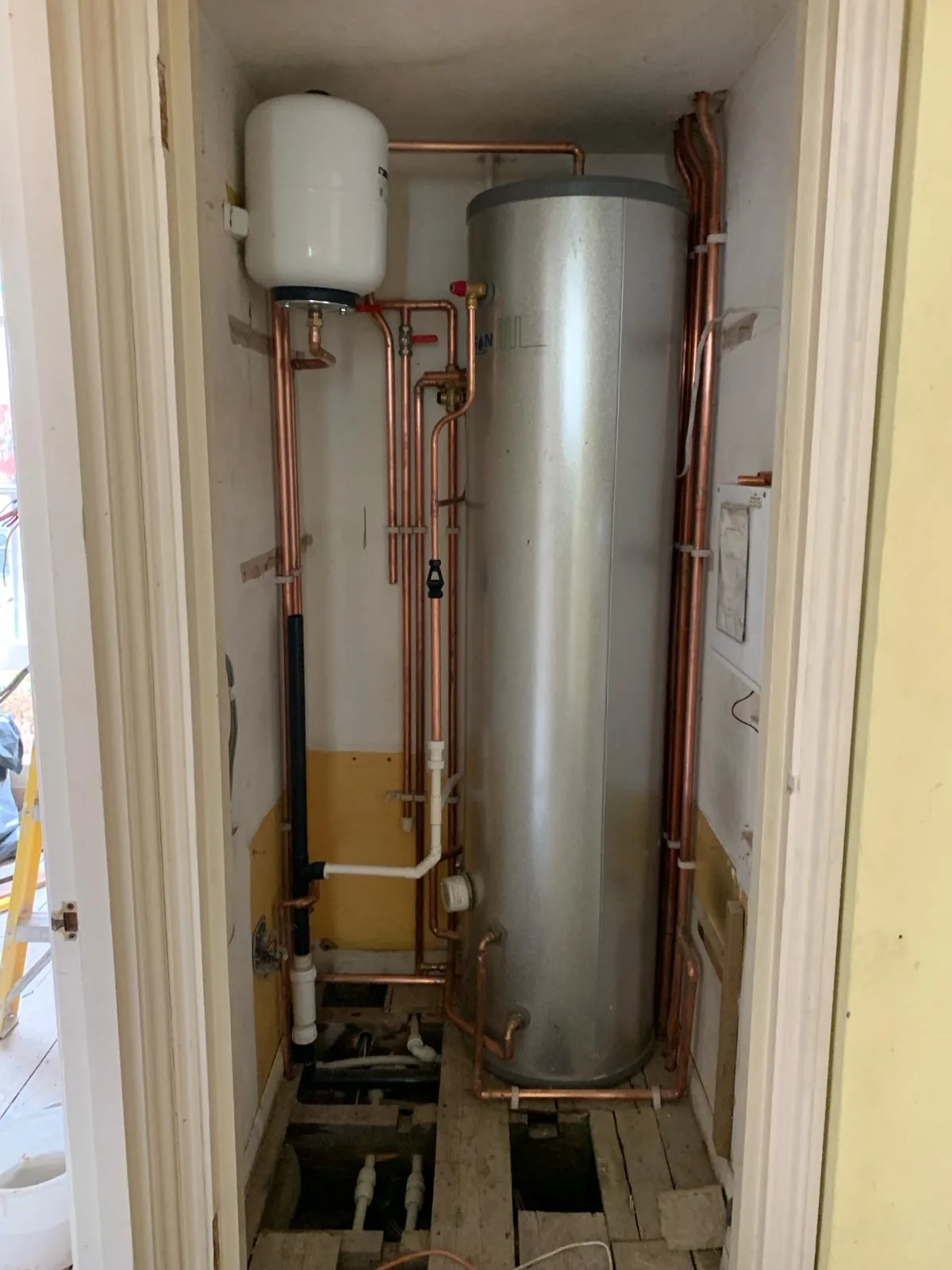 New hot water cylinder fitted in airing cupboard