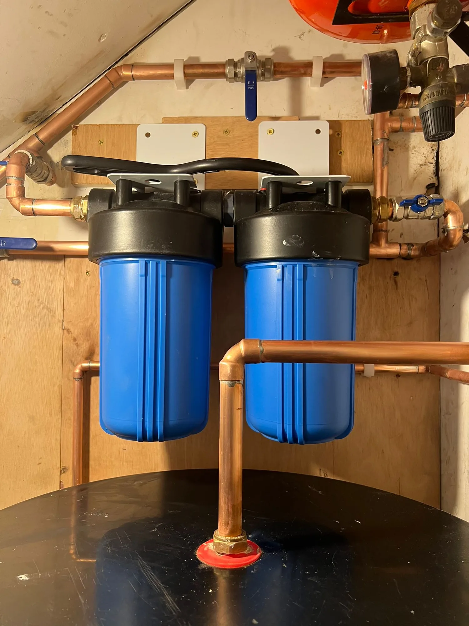 Twin water filter system on copper pipework